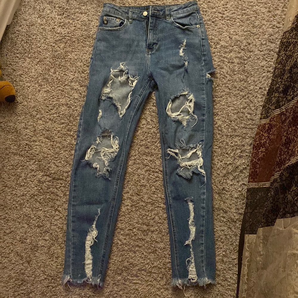 Jeans ripped size 3